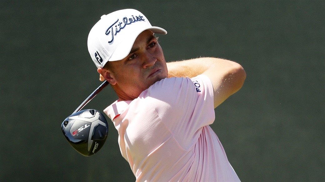 Justin Thomas watches his Pro V1x golf ball split the fairway after a drive with his Titleist TS3 driver